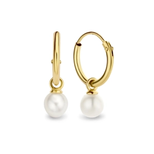 Detailed macro view of elegant gold hoop earrings with polished white round pearls