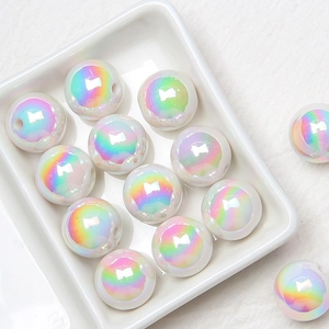 Macro shot of 16mm iridescent acrylic round beads with rainbow luster for jewelry DIY