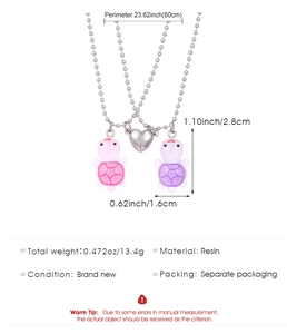 Close-up of magnetic heart connector on glowing turtle resin pendant necklaces