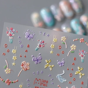 3D embossed nail stickers featuring macaron butterflies and flowers with matte texture