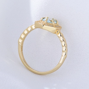 Elegant s925 silver gold ring with hexagonal sky blue topaz and surrounding diamonds