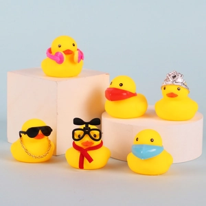 Christmas countdown advent calendar with 6 assorted rubber ducks on white stands