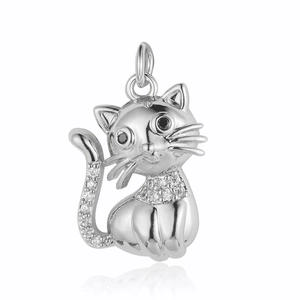 Detailed close-up of a silver cat pendant with pavé cubic zirconia and black stone eyes
