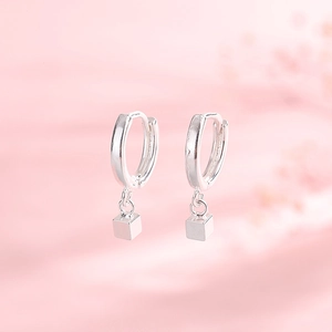 Minimalist S925 sterling silver square geometric hoop earrings for women on pink background