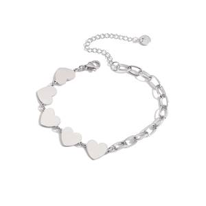 Detailed macro of stainless steel heart chain bracelet showing the adjustable lobster clasp