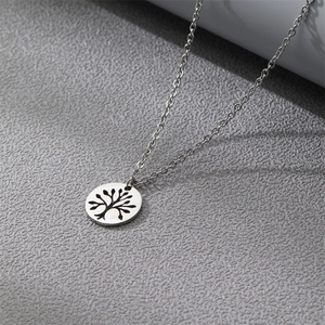Silver stainless steel tree of life pendant necklace with fine chain on grey background