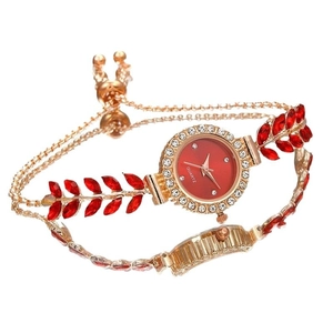 Luxury gold women quartz watch with red gemstones and sparkling rhinestone bezel