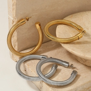 Minimalist spiral textured chunky hoop earrings in polished gold and silver finish