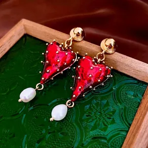 Vintage gold-plated heart earrings with red enamel and teardrop baroque pearls
