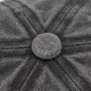 Detailed close-up of dark grey washed baseball cap crown with premium stitching