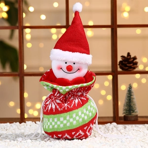 Knitted Christmas drawstring gift bag featuring a 3D plush snowman and snowflake pattern
