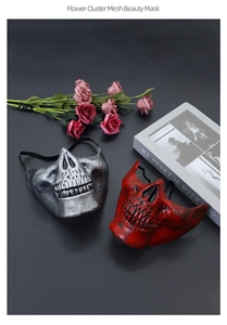 Detail view of silver and dark red half-face skull masks with realistic bone texture