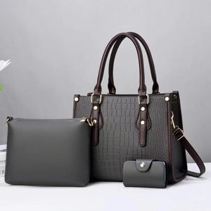 Three-piece dark grey tote bag set with crocodile texture and contrast brown handles