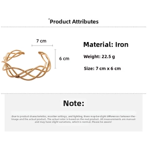 Detail showing dimensions of golden twisted geometric cuff bracelet made of iron