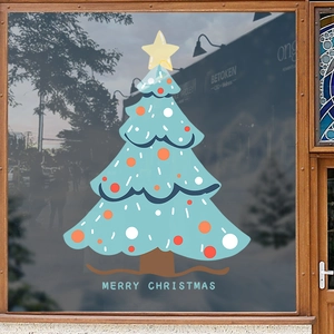 Blue Christmas tree window static sticker with festive ornaments on a glass window frame