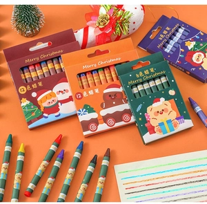 Close-up of 12-color Christmas crayon set with festive Santa and reindeer packaging