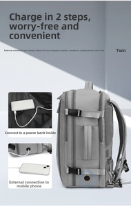 Close-up of the USB charging port and internal power bank connection on travel backpack
