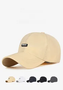 Close-up of quick-dry baseball cap showing durable stitching and rubber logo patch