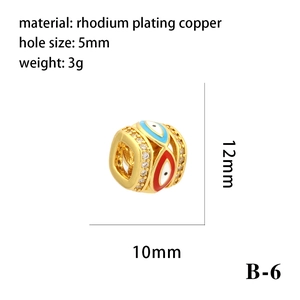 Tableau de taille détaillé du pendentif œil maléfique doré avec dimensions 12mm x 10mm