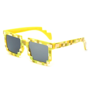 Green and yellow mosaic pixel party sunglasses with dark grey lenses in a side view