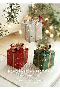 Détail de boîtes cadeaux étoiles lumineuses avec LED chaude pour décoration de Noël