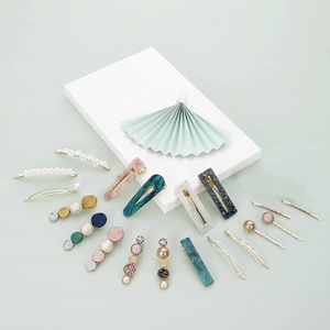 Assorted acetate hair clip set with marble, pearl, and rhinestone accents in vibrant colors