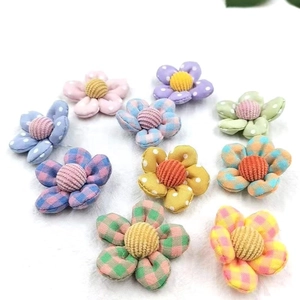 Nine colorful fabric floral accessories for DIY hair clips and summer craft decorations