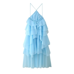 Detail of light blue chiffon tiered dress with halter neck and lace-up back design