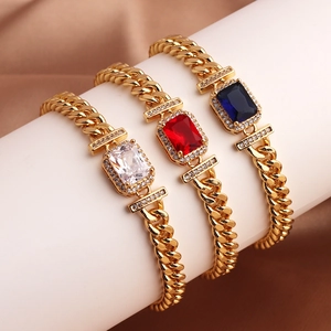 Luxury gold plated Cuban bracelets with colorful rectangle zircon stones on display