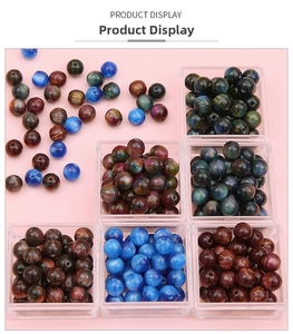 Macro shot of 8-12mm cat eye resin beads in multiple colors for DIY jewelry making