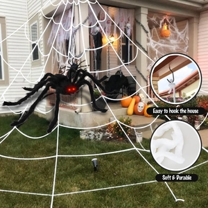 Giant Halloween plush spider with glowing red eyes and large white web for party decor