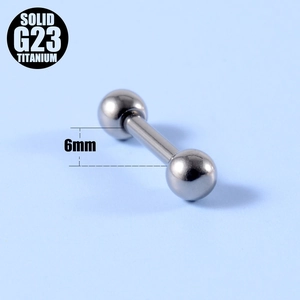 Macro detail of 6mm solid G23 titanium barbell piercing stud with a polished finish