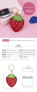 Detailed view of red strawberry leather card holder keychain with dimensions 5.5cm x 7cm