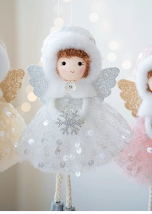 Detail of Christmas angel doll with sequin mesh skirt and sparkling silver wings