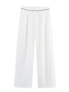 Detail of white wide-leg pants featuring contrast black piping and a front button closure