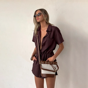 Detail of coffee brown short sleeve jumpsuit with drawstring waist and shirt collar