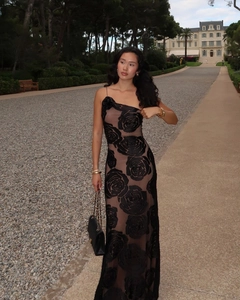 Detail of one-shoulder evening gown with 3D black rose lace and nude lining overlay