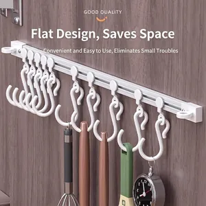 Space-saving sliding rail with white multi-functional hooks for kitchen utensils storage
