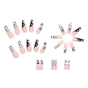 French black and white press-on nails with long coffin shape and daisy floral designs