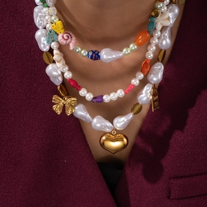 Collier multicouche bohème en acier inoxydable avec perles turquoise et pendentif cœur