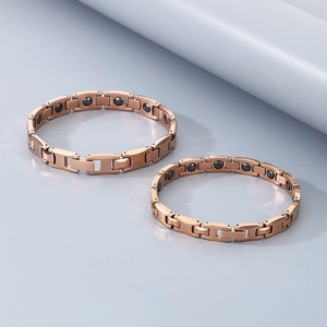 Detail of rose gold tungsten steel magnetic therapy bracelets with inlaid germanium stones