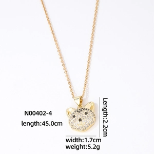 Golden pendant necklace with crystal paved bear head and dimensional measurements