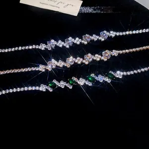 Three zircon tennis bracelets in purple, emerald, and white crystals with starburst effect