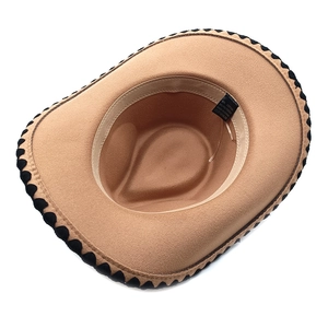Detail of western fedora hat interior showing the 65% cotton blend washing label