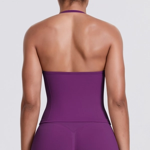 Detail view of seamless backless purple sports bra with snug fit for yoga and fitness