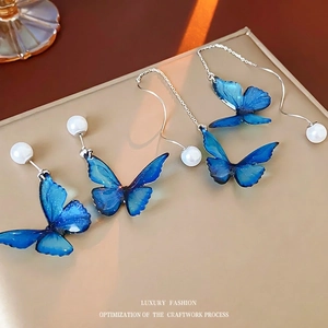 Modern butterfly pearl earring set with blue gradient wings and silver needles
