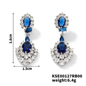Detailed view of luxury blue pear-shaped zircon earrings with 3.8cm length and 6.4g weight