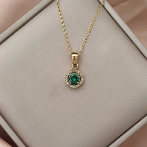 Luxurious gold stainless steel necklace featuring a round green zircon pendant for women