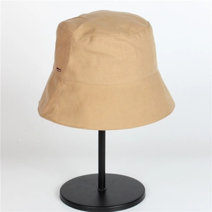 Khaki wide brim sun hat with red label on a display stand, foldable UV protection bucket hat