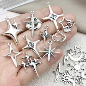 Silver alloy charms including stars moons and crosses for DIY jewelry making and crafts